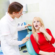 Patient in Fairfax discussing a root canal with their dentist