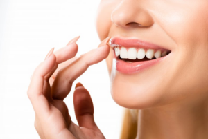 Close up of a woman appreciating her dental veneers